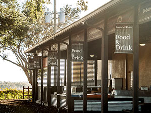 A pavlilion what has tables along with food bar and wine bar.
