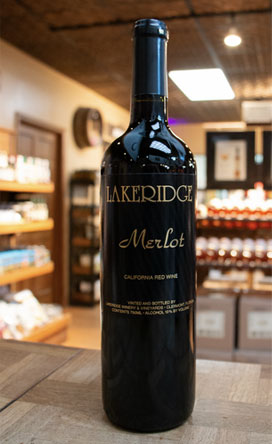 Bottle of Lakeridge Winery Merlot on the bar top.