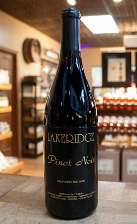 Bottle of Lakeridge Winery Pinot Noir on the bar top.