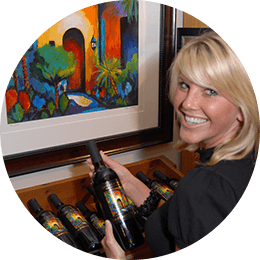 A young women looking at wine in the wine shop